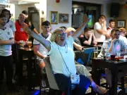England Fans Go Wild in Manchester Pub and Fanzones During World Cup Thriller
