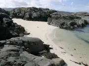 Remote Scottish Island Eilean Shona Offers Caribbean-Like Beach Cottages