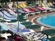 Sunbed Wars: Tourists Queue at Dawn, Miss Empty Rooftop Pool